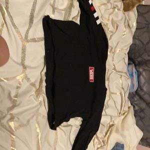 I am selling a vans shrit long slevle black and red